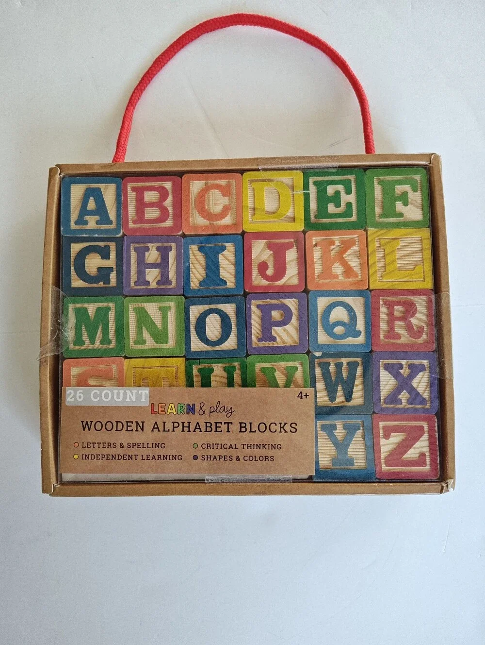 Wooden Alphabet Blocks Set encourages hands-on learning and shape recognition